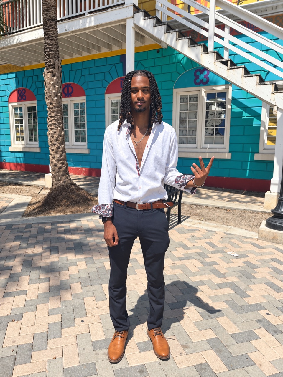 Christopher Klein outside a colorful building